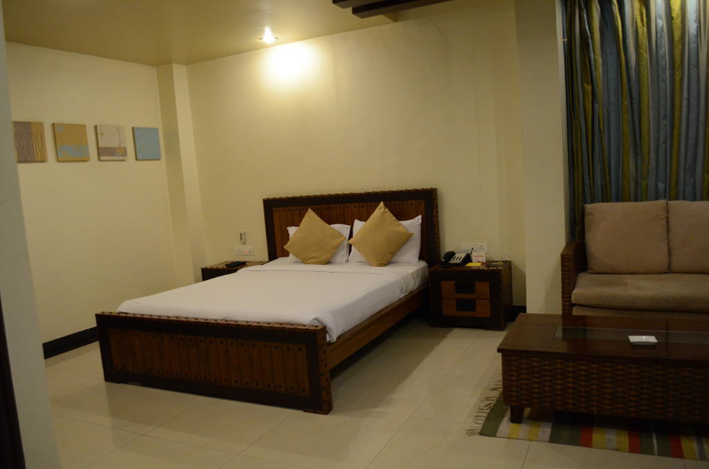 Hotel The Elite Suites Pune Zimmer foto